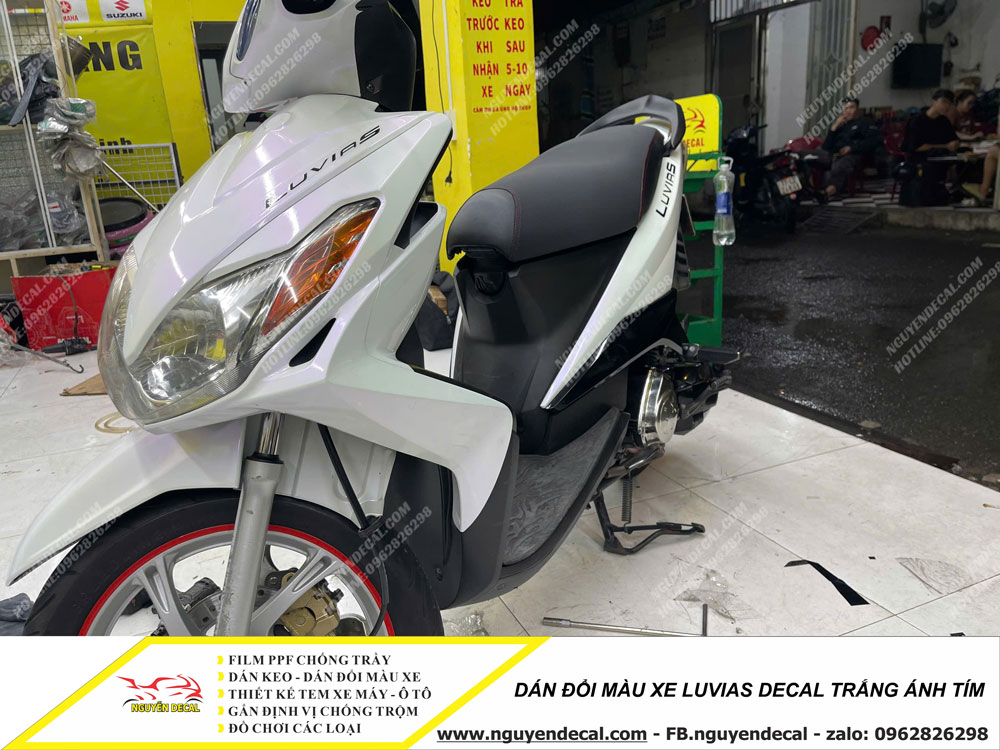 Dán đổi màu xe Luvias decal trắng ánh tím