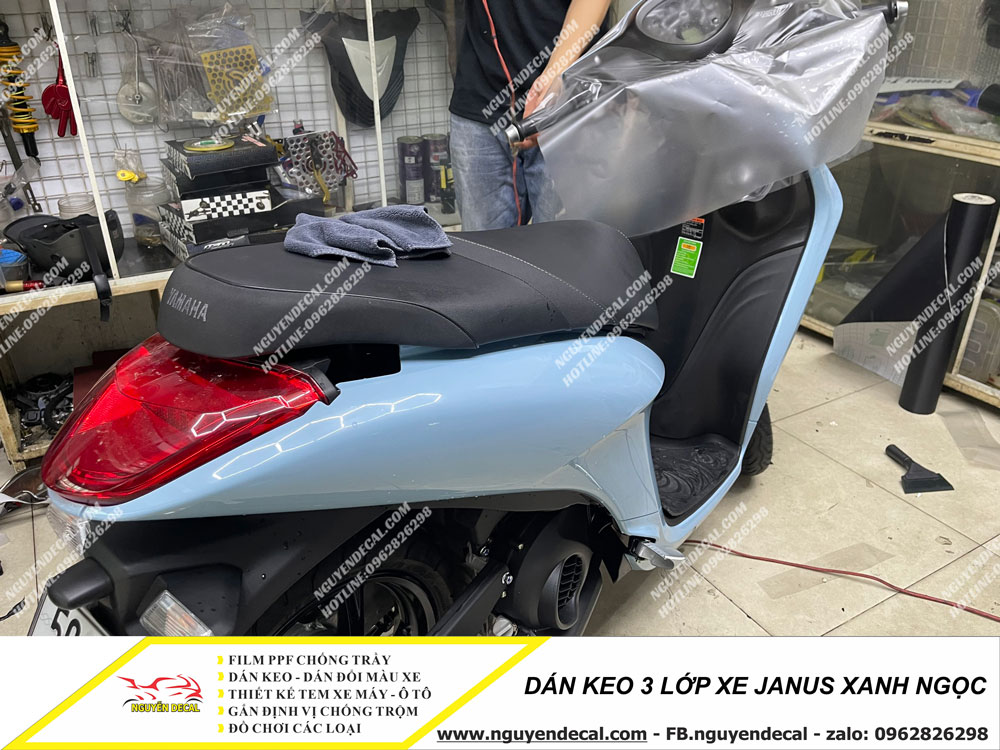 Dán keo 3 lớp xe Janus xanh ngọc