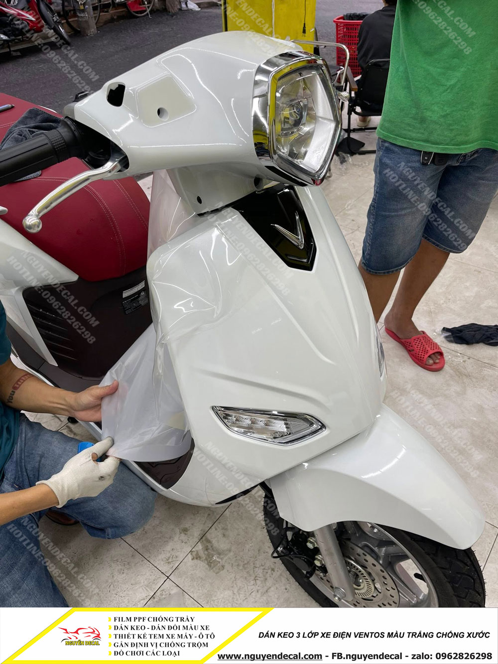 Dán keo 3 lớp xe điện Ventos màu trắng Dán keo 3 lớp xe điện Ventos màu trắng