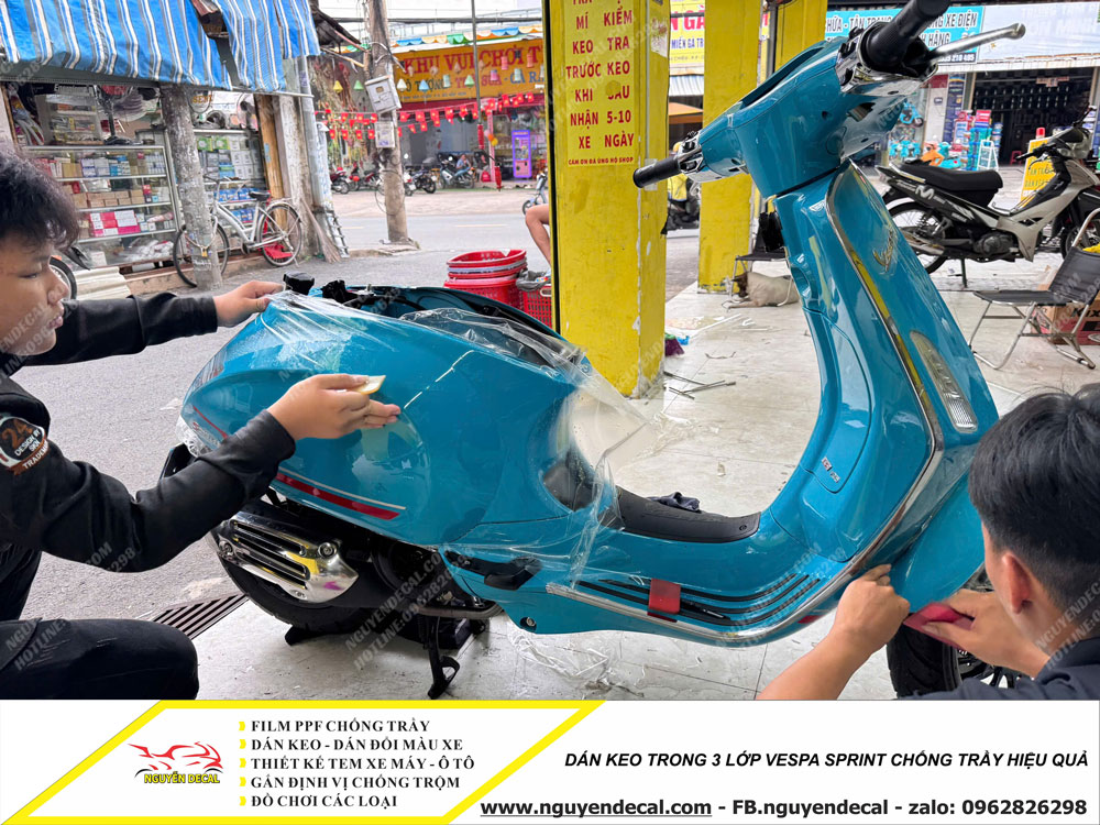 Dán keo trong 3 lớp xe Vespa