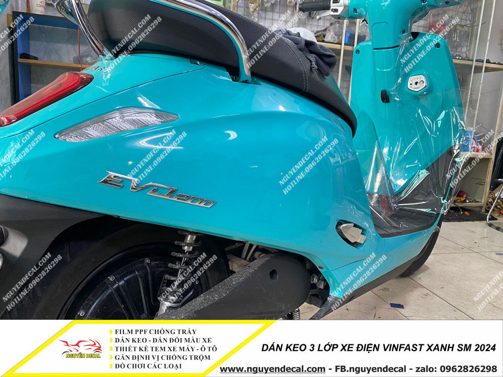 Dán keo 3 LỚP xe máy điện xanh Vinfast